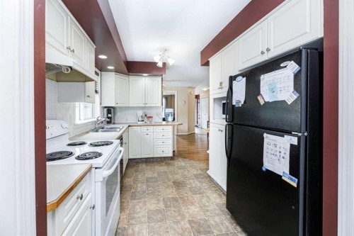 4618 55 Avenue, Lacombe, AB - Indoor Photo Showing Kitchen With Double Sink