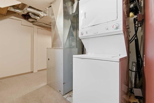 4625 48 Street, Red Deer, AB - Indoor Photo Showing Laundry Room