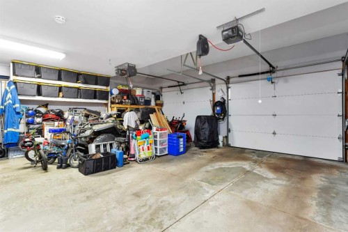 8 Pritchard Close, Sylvan Lake, AB - Indoor Photo Showing Garage