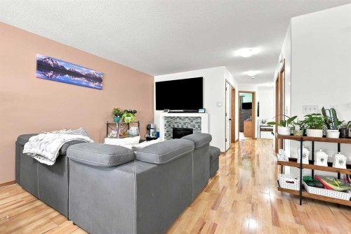 118 Oak Drive, Red Deer, AB - Indoor Photo Showing Living Room With Fireplace