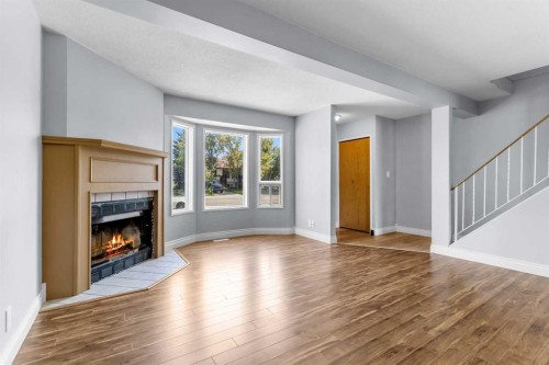204 Northey Avenue, Red Deer, AB - Indoor Photo Showing Other Room With Fireplace