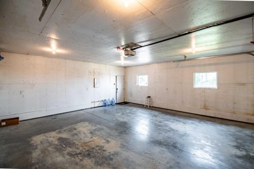 50 Trimble Close, Red Deer, AB - Indoor Photo Showing Garage