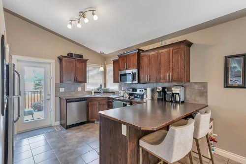 212 Cedar Square, Blackfalds, AB - Indoor Photo Showing Kitchen With Stainless Steel Kitchen With Double Sink
