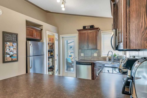 212 Cedar Square, Blackfalds, AB - Indoor Photo Showing Kitchen With Stainless Steel Kitchen With Double Sink