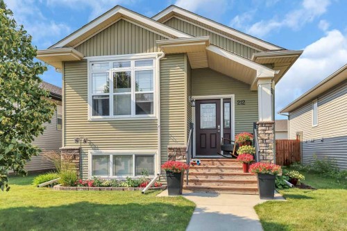 212 Cedar Square, Blackfalds, AB - Outdoor With Deck Patio Veranda With Facade