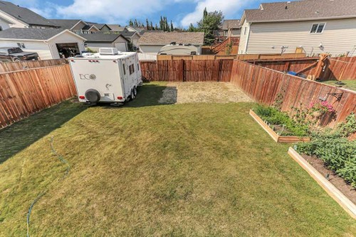 212 Cedar Square, Blackfalds, AB - Outdoor With Deck Patio Veranda