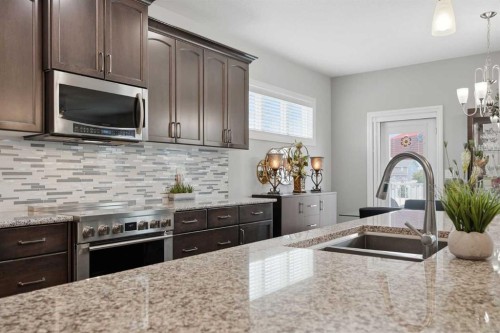 2 Traynor Close, Red Deer, AB - Indoor Photo Showing Kitchen With Double Sink With Upgraded Kitchen
