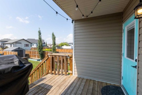 19 Hanson Green, Penhold, AB - Outdoor With Deck Patio Veranda With Exterior