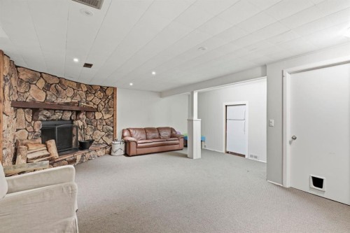 67 Sherwood Crescent, Red Deer, AB - Indoor With Fireplace