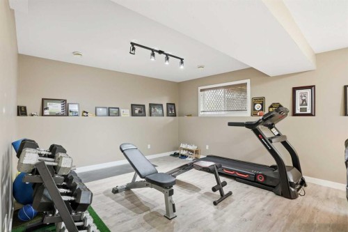 144 Bowman Circle, Sylvan Lake, AB - Indoor Photo Showing Gym Room