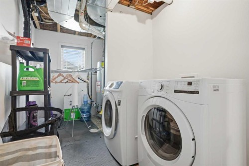 144 Bowman Circle, Sylvan Lake, AB - Indoor Photo Showing Laundry Room