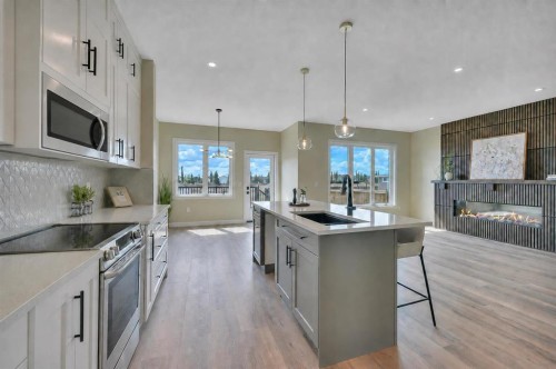 153 Norseman Close, Penhold, AB - Indoor Photo Showing Kitchen With Upgraded Kitchen