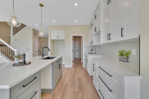 153 Norseman Close, Penhold, AB - Indoor Photo Showing Kitchen With Upgraded Kitchen