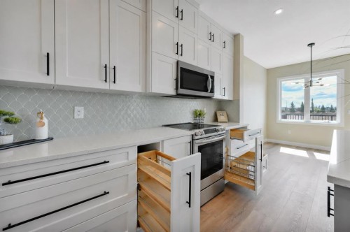 153 Norseman Close, Penhold, AB - Indoor Photo Showing Kitchen With Upgraded Kitchen