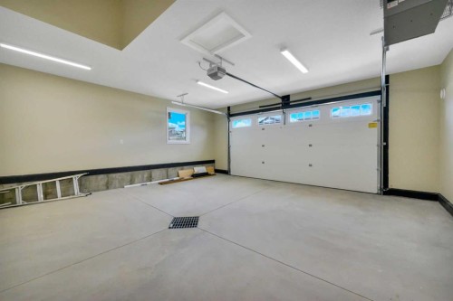 153 Norseman Close, Penhold, AB - Indoor Photo Showing Garage