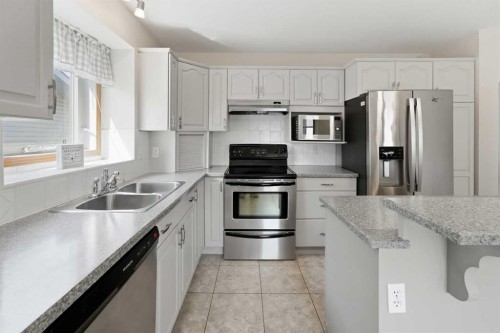 90 Duncan Crescent, Red Deer, AB - Indoor Photo Showing Kitchen With Stainless Steel Kitchen With Double Sink With Upgraded Kitchen
