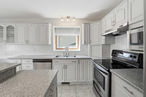 90 Duncan Crescent, Red Deer, AB - Indoor Photo Showing Kitchen With Stainless Steel Kitchen With Double Sink