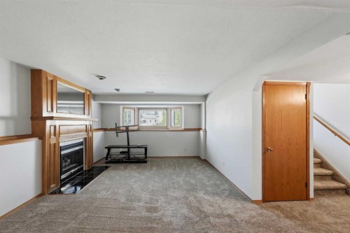 90 Duncan Crescent, Red Deer, AB - Indoor With Fireplace
