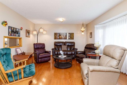 88 Mccullough  Cresent, Red Deer, AB - Indoor Photo Showing Living Room