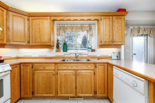 92 Anquetel Street, Red Deer, AB - Indoor Photo Showing Kitchen With Double Sink