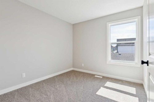 45 Silverton Glen Way Sw, Calgary, AB - Indoor Photo Showing Other Room