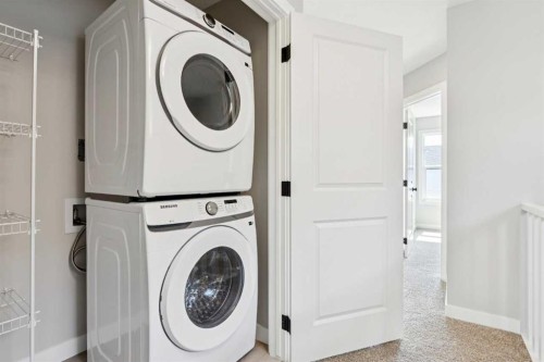 45 Silverton Glen Way Sw, Calgary, AB - Indoor Photo Showing Laundry Room