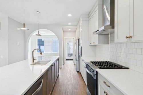 78 Bluerock Hill Sw, Calgary, AB - Indoor Photo Showing Kitchen With Upgraded Kitchen