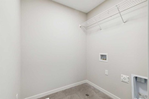 78 Bluerock Hill Sw, Calgary, AB - Indoor With Storage