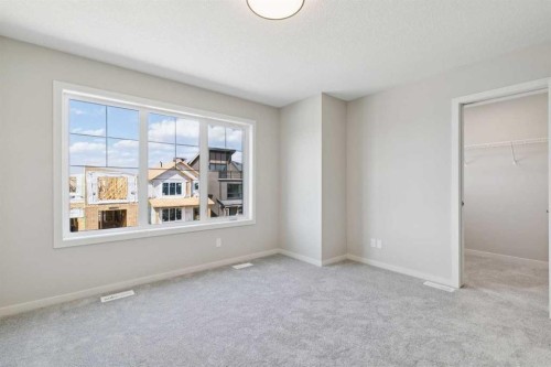 78 Bluerock Hill Sw, Calgary, AB - Indoor Photo Showing Other Room