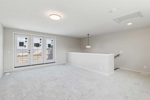 78 Bluerock Hill Sw, Calgary, AB - Indoor Photo Showing Other Room