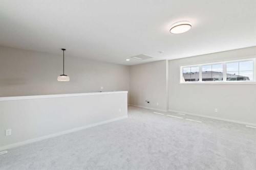 78 Bluerock Hill Sw, Calgary, AB - Indoor Photo Showing Other Room