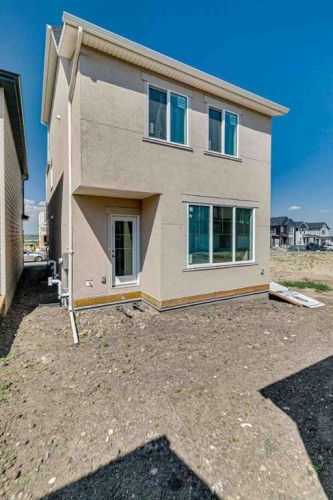 78 Bluerock Hill Sw, Calgary, AB - Outdoor With Exterior
