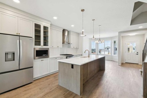 78 Bluerock Hill Sw, Calgary, AB - Indoor Photo Showing Kitchen With Upgraded Kitchen