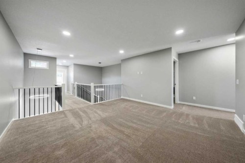 56 Osprey Hill Place Sw, Calgary, AB - Indoor Photo Showing Other Room