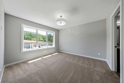 56 Osprey Hill Place Sw, Calgary, AB - Indoor Photo Showing Other Room