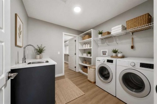 56 Osprey Hill Place Sw, Calgary, AB - Indoor Photo Showing Laundry Room