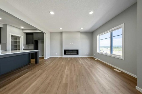 56 Osprey Hill Place Sw, Calgary, AB - Indoor With Fireplace