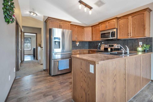 148 Oswald Close, Red Deer, AB - Indoor Photo Showing Kitchen With Double Sink