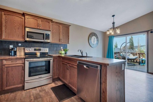 148 Oswald Close, Red Deer, AB - Indoor Photo Showing Kitchen With Double Sink