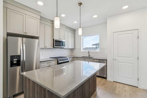 37 Bluerock Hill Sw, Calgary, AB - Indoor Photo Showing Kitchen With Upgraded Kitchen
