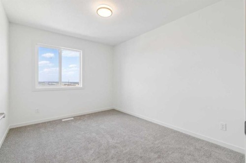 37 Bluerock Hill Sw, Calgary, AB - Indoor Photo Showing Other Room