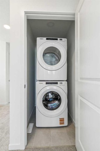 37 Bluerock Hill Sw, Calgary, AB - Indoor Photo Showing Laundry Room