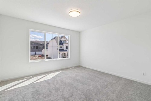 37 Bluerock Hill Sw, Calgary, AB - Indoor Photo Showing Other Room