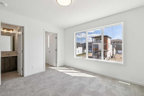 37 Bluerock Hill Sw, Calgary, AB - Indoor Photo Showing Other Room