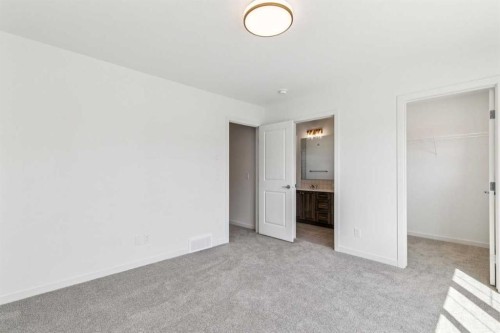 37 Bluerock Hill Sw, Calgary, AB - Indoor Photo Showing Other Room