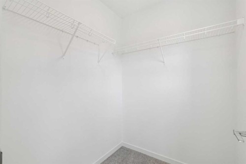 37 Bluerock Hill Sw, Calgary, AB - Indoor With Storage