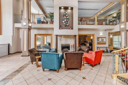 412-4512 52 Avenue, Red Deer, AB - Indoor With Fireplace