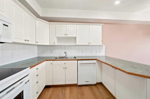412-4512 52 Avenue, Red Deer, AB - Indoor Photo Showing Kitchen With Double Sink