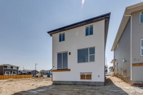 173 Southborough Common, Cochrane, AB - Outdoor With Exterior
