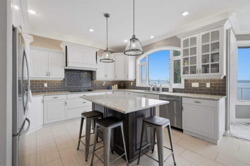 85 Grand Ave, Norglenwold, AB - Indoor Photo Showing Kitchen With Upgraded Kitchen